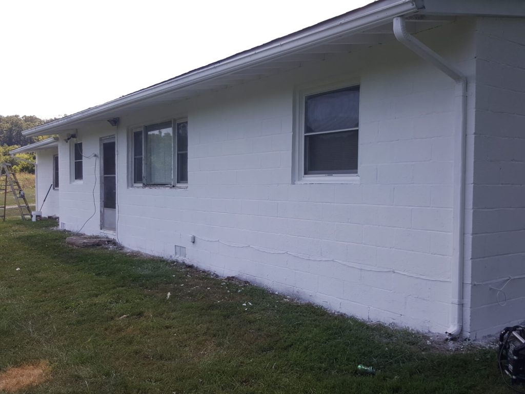 Freshly repainted building exterior in Winchester, VA by A+ Handyman