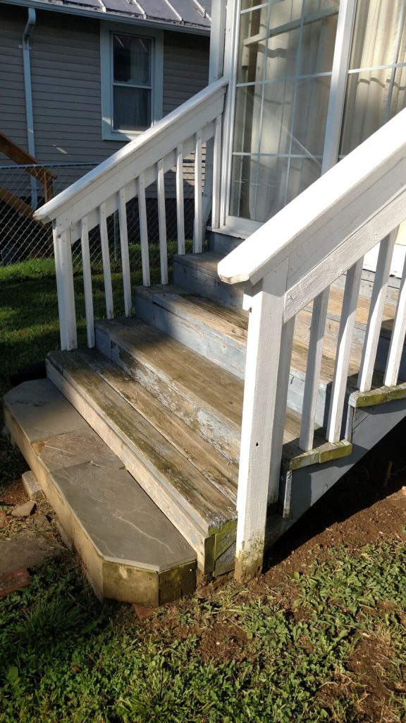 Crumbling, unsafe front steps before repair in Winchester, VA