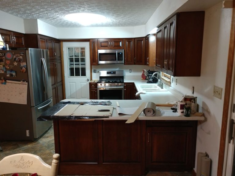 Remodeled kitchen with new cabinets and countertops in Winchester, VA by A+ Handyman