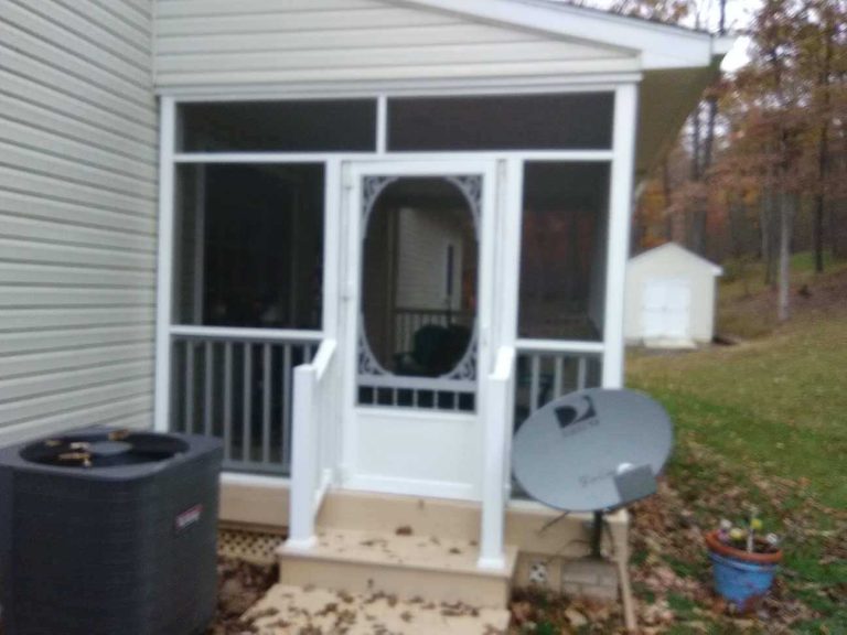 Restored and freshly painted front porch in Winchester, VA by A+ Handyman