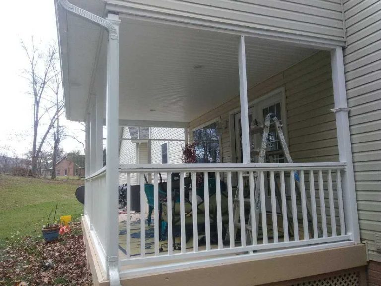 Sagging, peeling porch before restoration in Winchester, VA