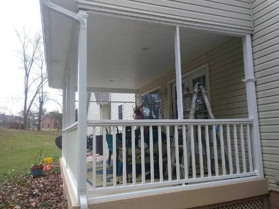 Sagging, peeling porch before restoration in Winchester, VA